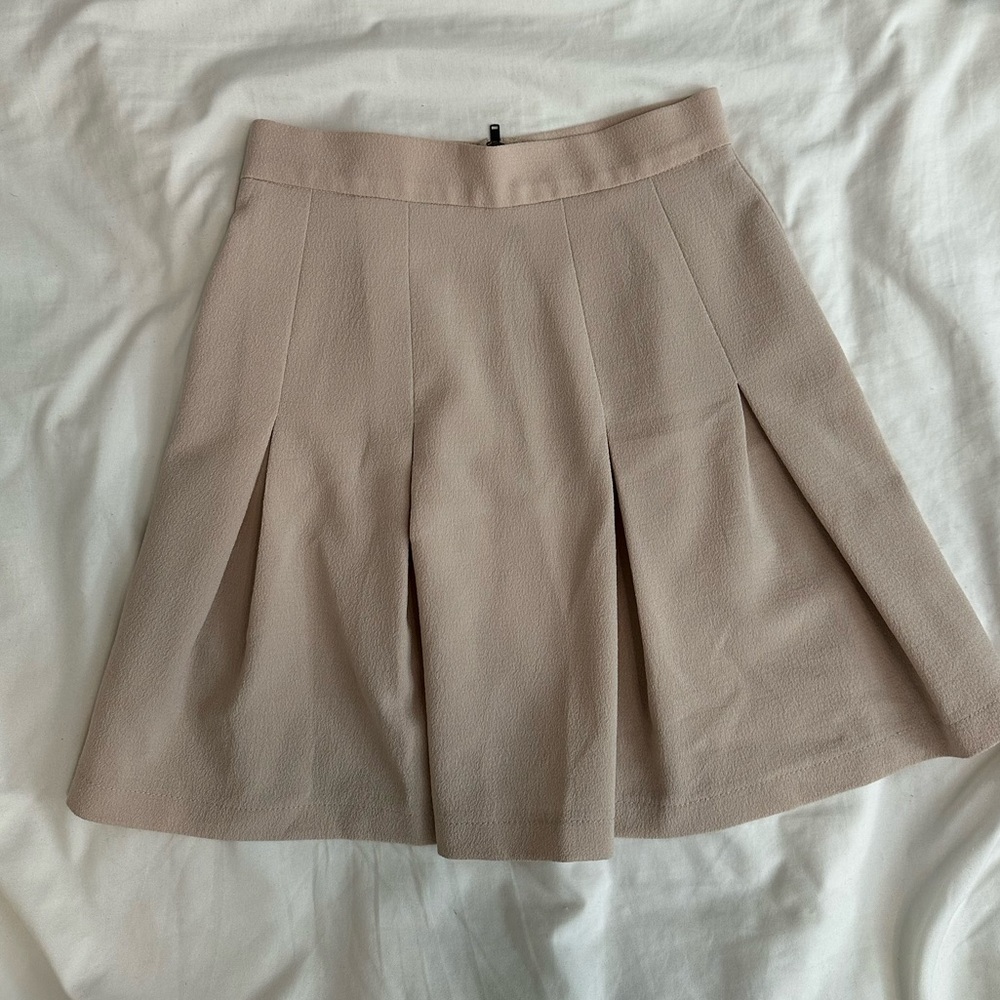 School girl pleated beige skirt